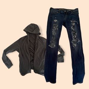 A nice/smooth soft Gray jacket with cut up jeans